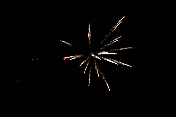 Fireworks in the night sky. - Фото, изображение