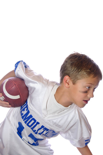Young football player on white - Foto, afbeelding