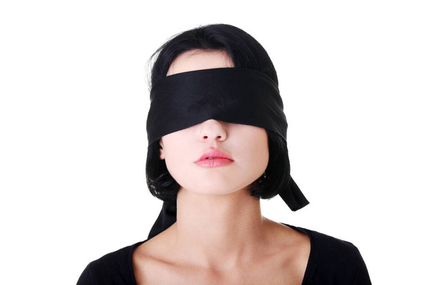 Portrait of the young woman blindfold , isolated on white  - Фото, зображення
