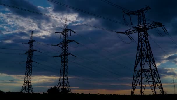 Timelapse of Electricity pylons and moving clouds - Footage, Video