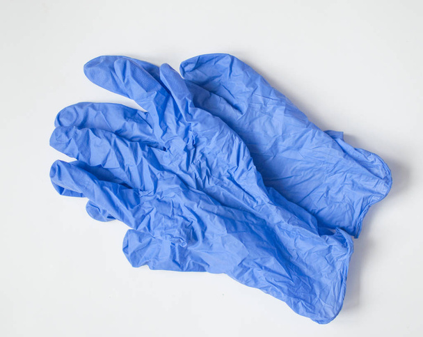 Μπλε γάντια σε λευκό φόντο - Φωτογραφία, εικόνα