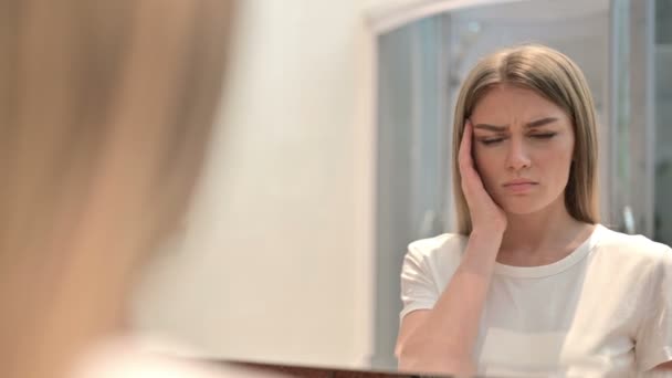 Rear View of Attractive Woman Looking in Mirror and having Headache  - Footage, Video