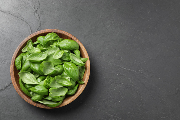 Fresh basil on grey table, top view. Space for text - Fotoğraf, Görsel