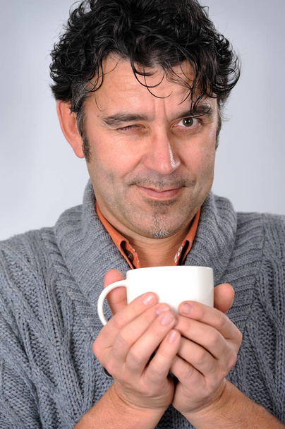 man with a cup of tea - Фото, зображення