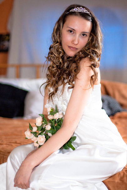beautiful bride in a wedding dress - Valokuva, kuva
