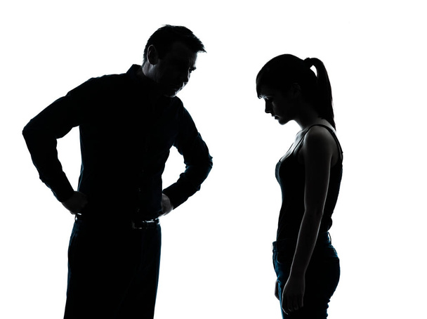 one man and teenager girl dispute conflict  in silhouette indoors isolated on white background - Foto, immagini
