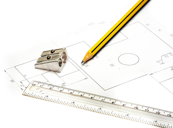 technical drawing with pencil ruler and sharpener - 写真・画像