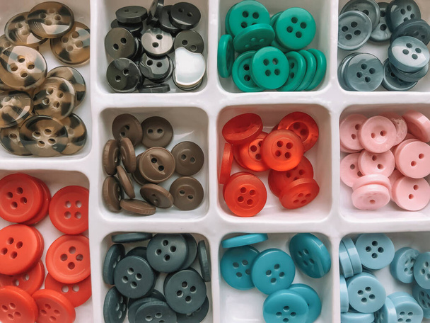Set of buttons of different colors. Sewing accessories. - Fotoğraf, Görsel