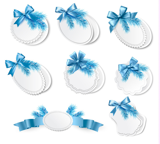 Set of christmas retro labels with blue gift bows with ribbons. - Vektör, Görsel