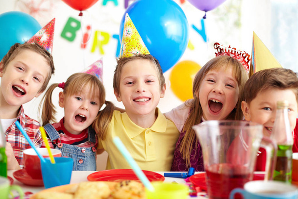 Group of adorable kids having fun at birthday party - Foto, Imagem