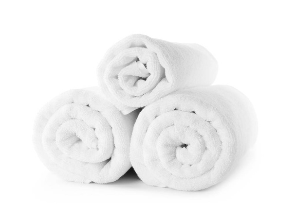 Rolled fresh clean towels on white background - Fotó, kép