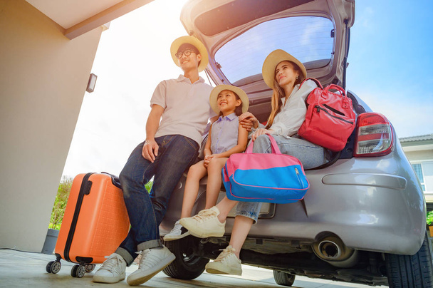 Family prepare and arrange luggages and packing ready to traveling outdoors journey in summer time long weekend vacations, coverage insurance through the trip for safety lif - Foto, Bild