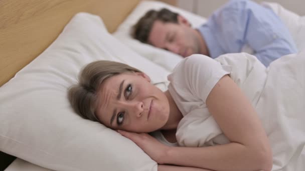 Upset Young Woman Thinking about Family in Bed - Filmagem, Vídeo