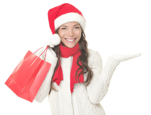 Christmas shopping woman showing copys pace excited - Foto, Imagen