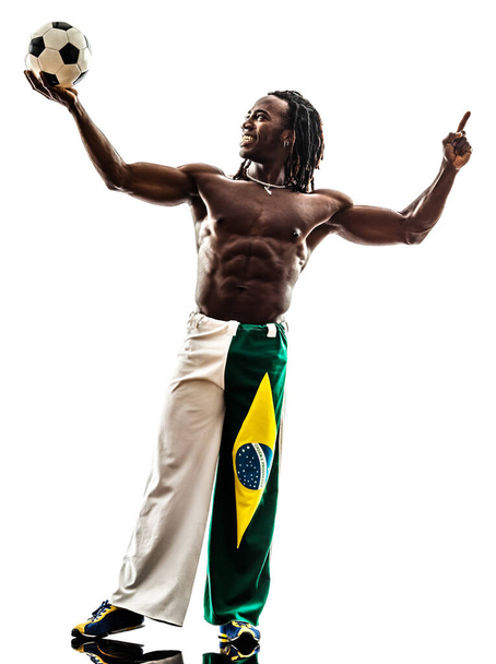 one brazilian black man soccer player holding showing football  on white background - Foto, Imagen
