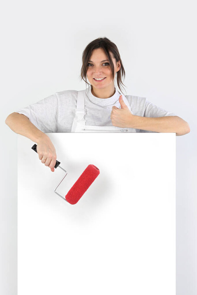 Decorator with a board left blank for your message - Photo, image