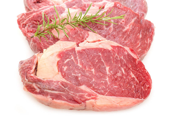 beef entrecote with rosemary on white background - Foto, Bild