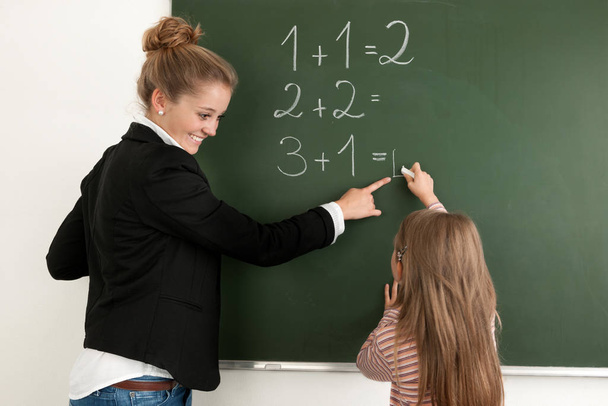student learning numeracy in the classroom - Foto, Imagen