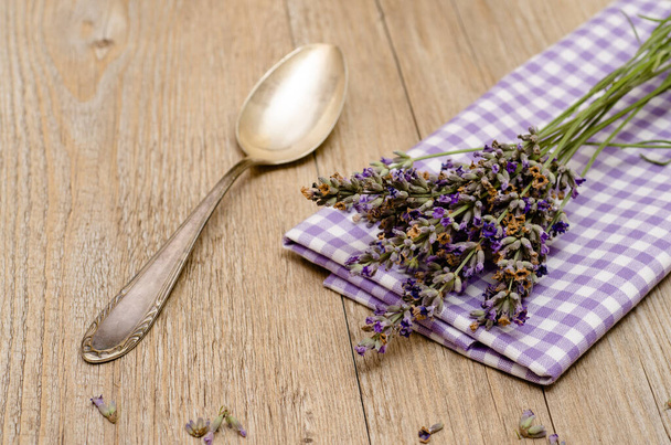 spoon and lavender on a wooden table - Foto, Imagem