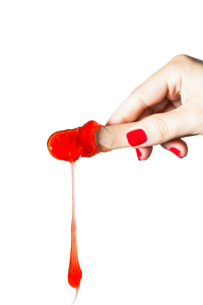 Red wax depilation dripping - Фото, изображение