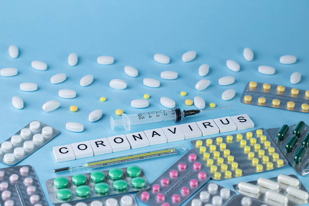 Pills with CORONAVIRUS text. Virus Pandemic Protection Concept - Foto, Imagem