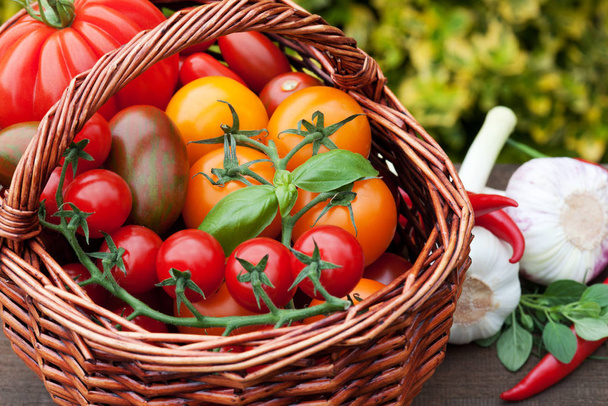 wicker basket with tomatoes - Photo, Image