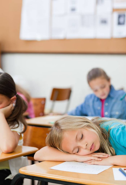 Student snoozing in class - Фото, изображение