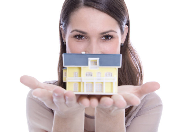 the dream of home ownership - woman with a property isolated - Foto, Imagen