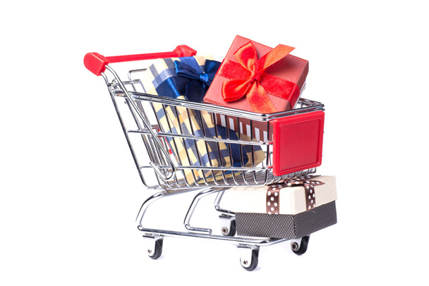 Shopping trolley full of Christmas presents - Photo, Image