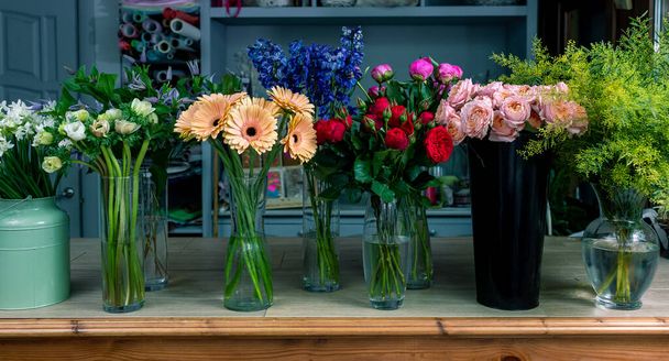 Floral shop concept . Beautiful bouquet of mixed flowers. Handsome fresh bunch. Flowers delivery. - Fotó, kép