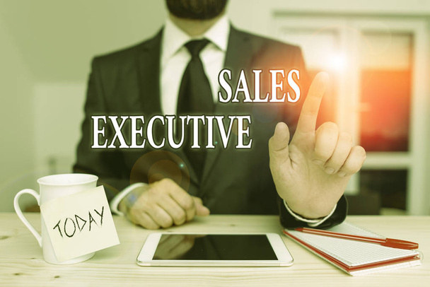 Conceptual hand writing showing Sales Executive. Business photo text responsible for the overall sales activities of the company Male human wear formal clothes present use hitech smartphone. - Photo, Image