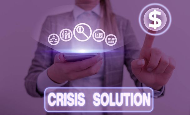 Writing note showing Crisis Solution. Business concept for process by which an organization deals with a disruptive - Photo, Image