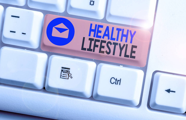 Writing note showing Healthy Lifestyle. Business concept for way of living that lowers the risk of being seriously ill - 写真・画像