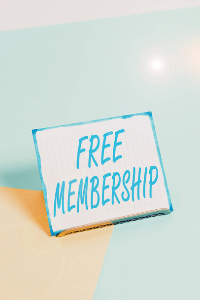 Conceptual hand writing showing Free Membership. Concept meaning get access to the creative community without paying anything Paper on buffer wire on soft pastel multi colours backdrop - Fotó, kép