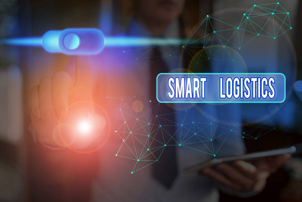 Escritura a mano de texto Smart Logistics. Concepto que significa integración de la tecnología inteligente en el sistema logístico
. - Foto, Imagen