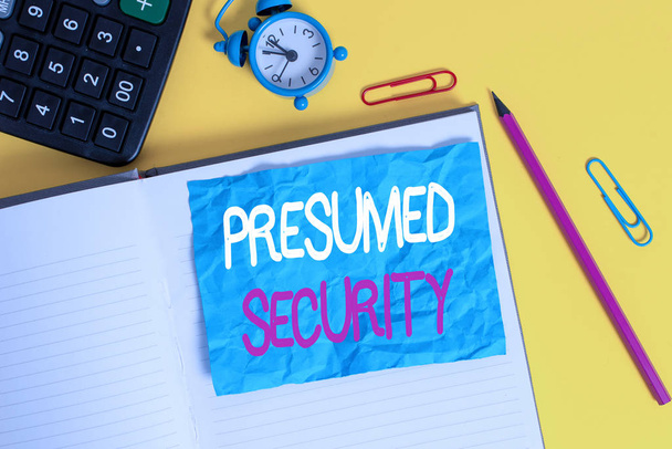 Conceptual hand writing showing Presumed Security. Concept meaning system safe from attack due to attacker assume its safe Notebook calculator pencil crushed sheet color background - Photo, Image