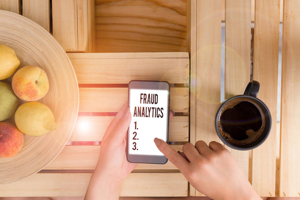 Escrita conceitual mostrando Fraude Analytics. Conceito que significa a identificação da fraude real ou esperada
 - Foto, Imagem