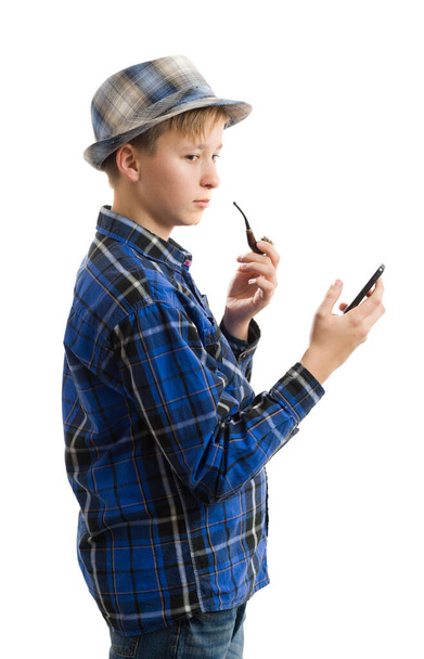 boy with a mobile phone isolated on white - Photo, image