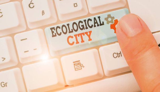 Writing note showing Ecological City. Business concept for huanalysis settlement modeled on the self sustaining structure - 写真・画像