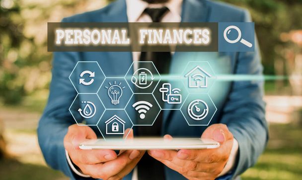 Text sign showing Personal Finances. Business photo text the activity of analysing own money and financial decisions - 写真・画像