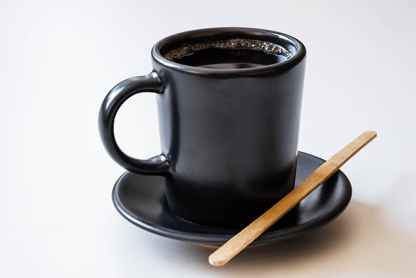 Cup on a light background. Hot drink. Aroma of coffee. Breakfast food and coffee. - Photo, Image