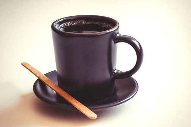 Cup on a light background. Hot drink. Aroma of coffee. Breakfast food and coffee. - Photo, Image
