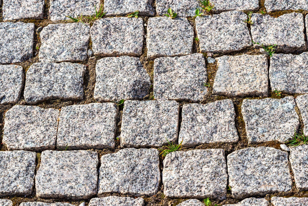 Background of cobblestones making from stone blocks - Valokuva, kuva