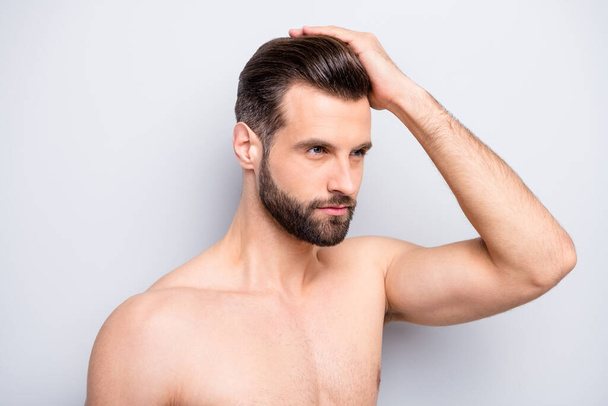 Closeup photo of macho man guy hold hand touch perfect neat hairstyle look mirror empty space naked torso hot body groomed face isolated grey background - Fotoğraf, Görsel