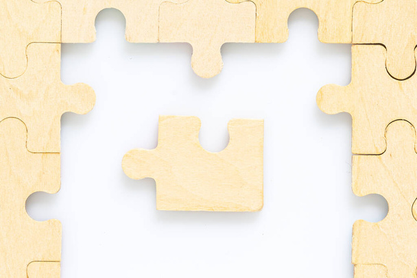 wooden jigsaw puzzle pieces on white background - Photo, Image
