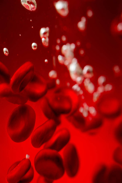Czerwone krwinki odpowiedzialne za przenoszenie tlenu, regulacja krwi ph, żywność i ochrona klatek organizmu. - Zdjęcie, obraz