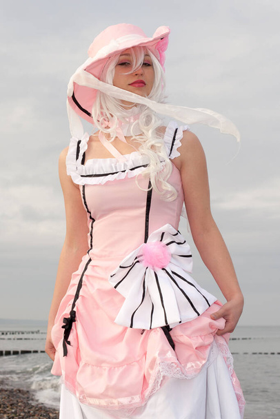 girl posing in cosplay costume   - Fotó, kép