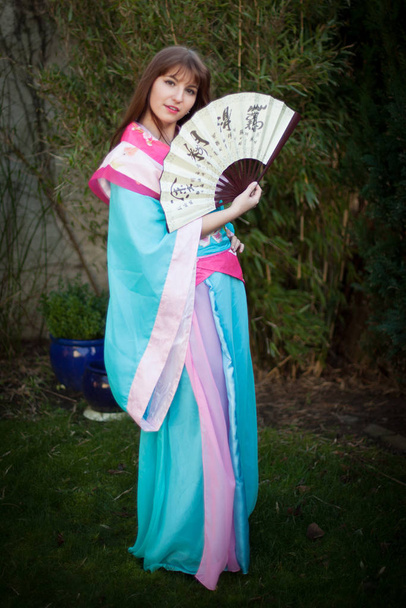 girl posing in cosplay costume   - Fotó, kép