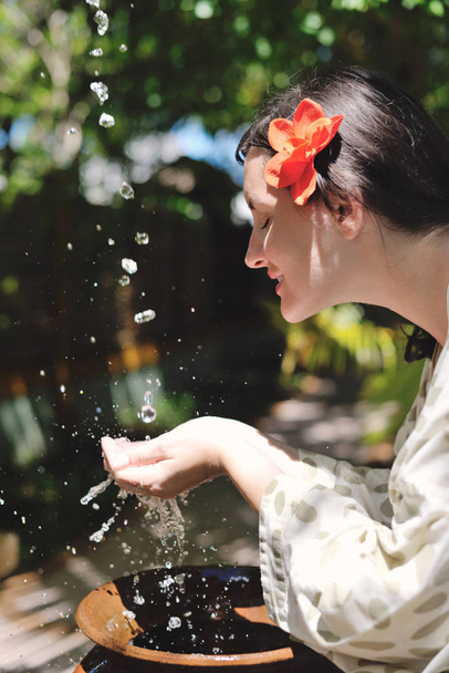 splashing fresh  water drops on girl soft skin  care for sensuality woman hands - Fotoğraf, Görsel
