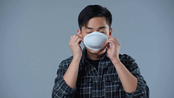 asian man coughing isolated on grey  - Footage, Video
